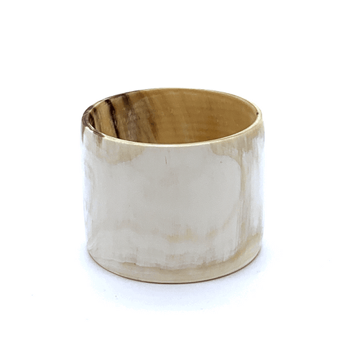 A picture of spinning Polished White with accents of mushroom Artisan Old Fashioned Online cuff bangle bracelet, ethically sourced natural buffalo horn