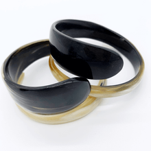 Load image into Gallery viewer, A picture of Pair of  of Small Old Fashioned Online Minimalist polished ebony to ivory Artisan spiral bracelet bangle, made from ethically sourced natural horn

