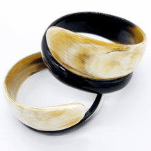 Load image into Gallery viewer, A picture of pair of Small Old Fashioned Online Minimalist polished Ivory to ebony Artisan spiral Cuff bangle, made from ethically sourced natural horn
