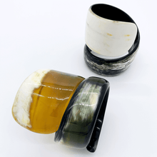 Load image into Gallery viewer, A picture of 2 large Old Fashioned Online Wide Minimalist polished black white and mushroom spiral Cuff bangle, made from ethically sourced natural horn