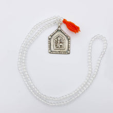 Load image into Gallery viewer, Clear Beaded Old Fashioned Online charm with red tassel and silver pendant charm on on flat lay
