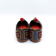 Load image into Gallery viewer, Ethically sourced bohemian Old Fashioned Online flats with purple, green and gold spiral path embroidery, red pompoms and cushioned footbed back view
