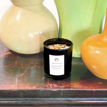 Load image into Gallery viewer, old fashioned online renew activate candle next to 3 sorbet coloured vases
