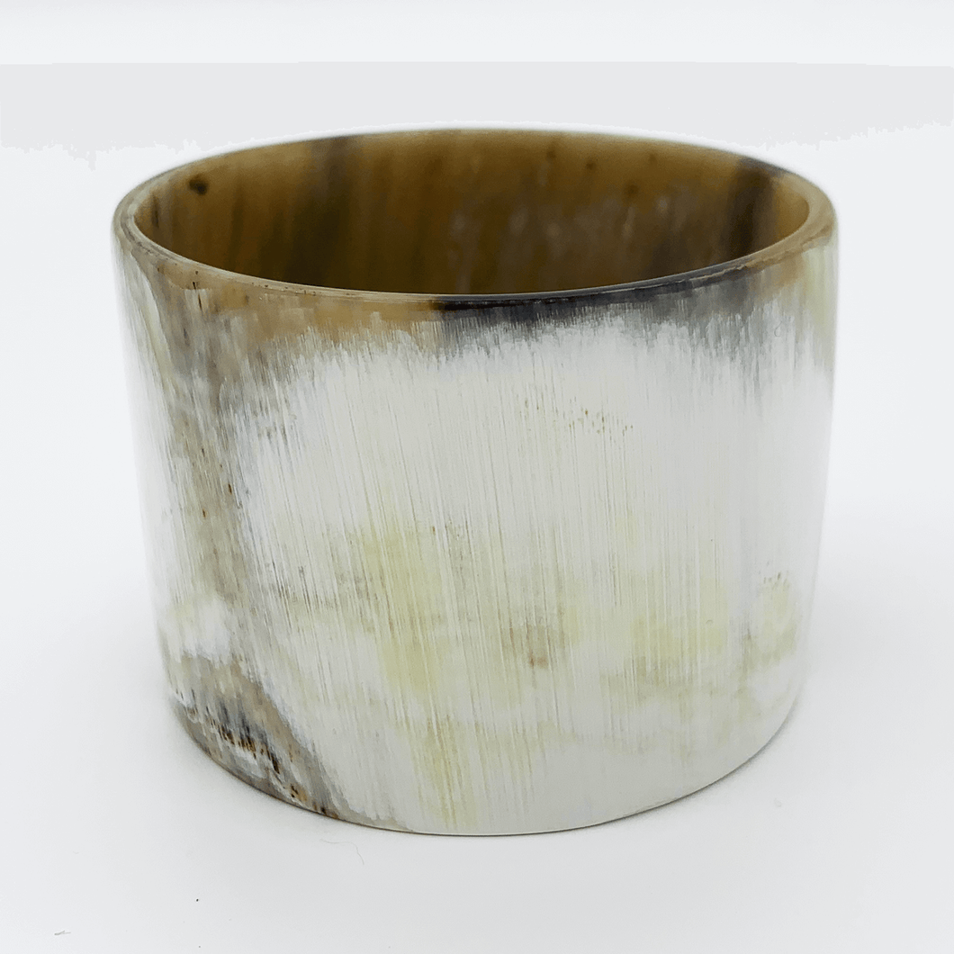 A picture of a Polished White with accents of mushroom Artisan Old Fashioned Online cuff bangle bracelet, ethically sourced natural buffalo horn
