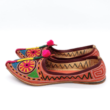 Load image into Gallery viewer, Old Fashioned Online Indian bohemian leather slippers with pink and gold fortune embroidery with pompoms and cushioned footbed side view 1
