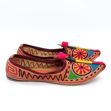 Load image into Gallery viewer, Old Fashioned Online Indian bohemian leather slippers with pink and gold fortune embroidery with pompoms and cushioned footbed side view 2
