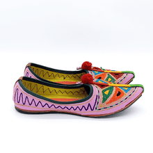 Load image into Gallery viewer, Ethically sourced bohemian Old Fashioned Online Pink Leather slip-on with blue, green and red triangle embroidery, red pompoms and cushioned footbed side view2 
