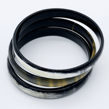 Load image into Gallery viewer, A picture of a stack of 6 slender monochrome Old Fashioned Online bangle bracelet, ethically sourced natural buffalo horn
